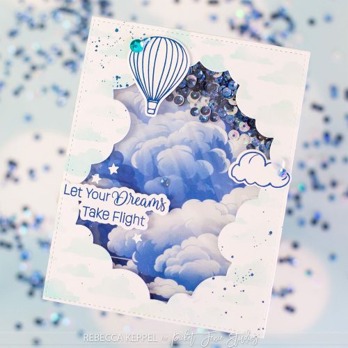 A2CloudPeekABooCoverPlate YoureOnYourWayUpStampsAndDies OnaCloudyDayStencil6x8Stencil FabulouslyGlossyA2CardFrontsBlueSkiesAhead PaperSplatterWatercolorLiquidNavyStripes SequinMixOnaM